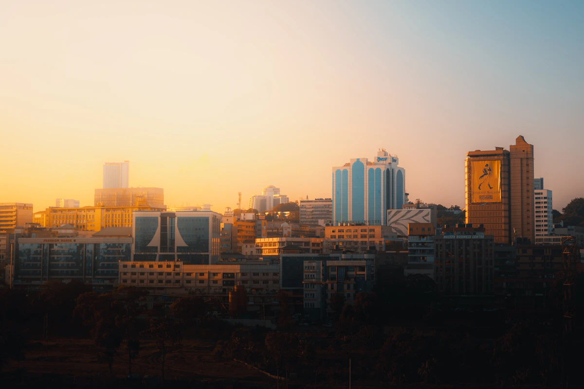 Kampala skyline in warm evening light, seen from Nsambya.
